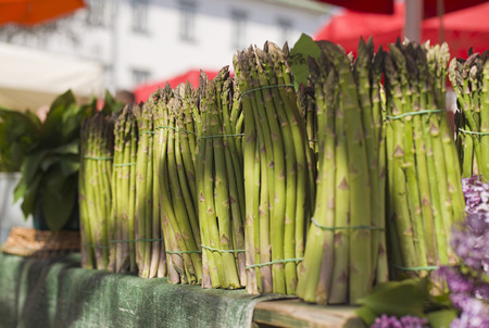 Bouquet of fresh asparagus at the market.の写真素材