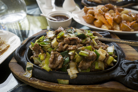 Chinese food - stir fry beef with vegetables sauce.の写真素材