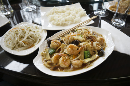 Chinese food - stir fry shrimps with vegetables and mushrooms.の写真素材