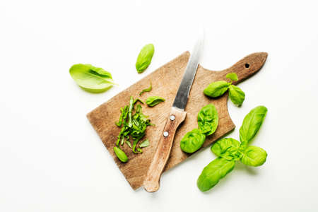 Fresh basil leaves on white background close up.の写真素材