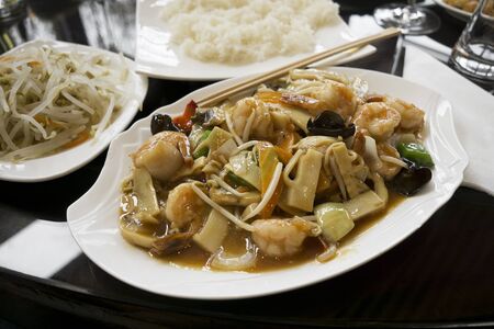 Chinese food - stir fry shrimps with vegetables and mushrooms.の写真素材