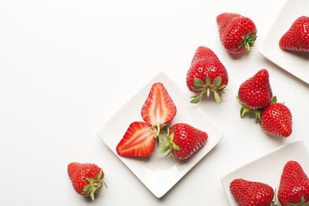 Fresh red strawberry on a white background close up.の写真素材