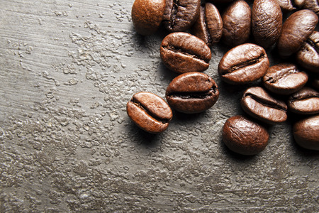 Coffee beans on a grunge background close up.の写真素材