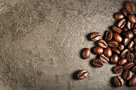 Coffee beans on a grunge background close upの写真素材