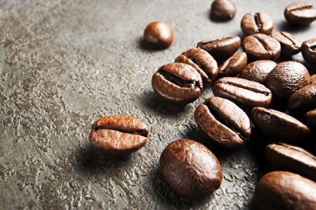 Coffee beans on a grunge background close upの写真素材
