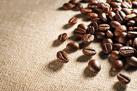 Coffee beans on the basis of goods close upの写真素材