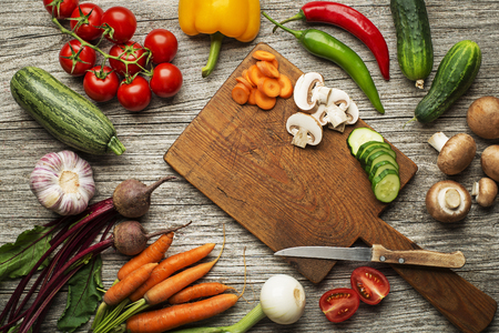 Various fresh vegetables and ingredients on wooden rustic backgroundの写真素材
