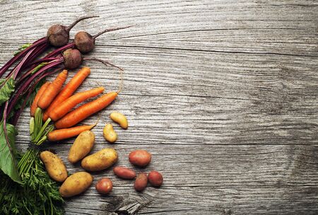 Various fresh vegetables and ingredients on wooden rustic backgroundの写真素材