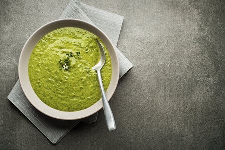 Fresh healthy vegetable green soup overhead shoot.の写真素材