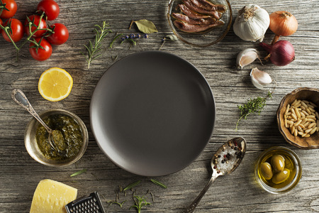 Fresh vegetables and ingredients for cooking on wooden background place for text. 
Vegan food vegetarian and healthy cooking concept.の写真素材