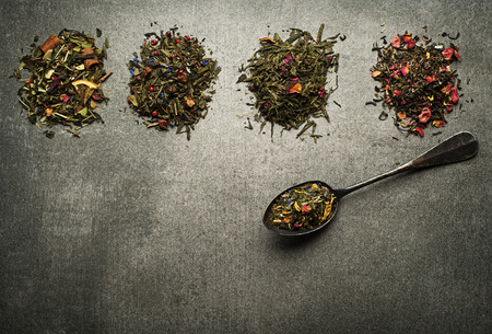 Dry Tea collection of different types on gray backgroundの写真素材
