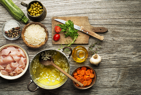 Ingredients with chicken and vegetables for cooking risottoの写真素材