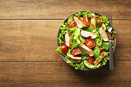 Fresh green salad with chicken breast and tomatoの写真素材