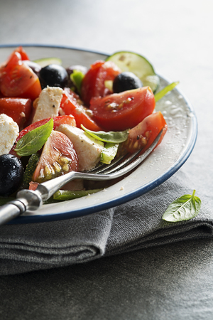 Salad with feta cheese and fresh tomatoes. Greek salad.の写真素材