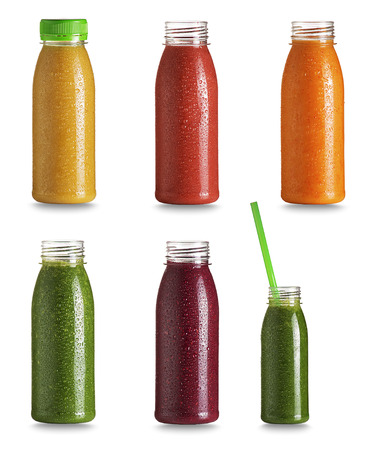 Collection of bottles with fresh healthy smoothie with vegetabls and fruits. Raw, vegan, vegetarian, alkaline food concept.の写真素材