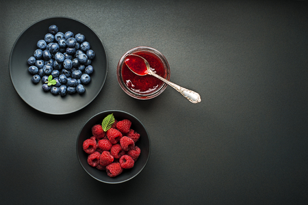 Homemade marmalede or jam from fresh mixed berriesの写真素材