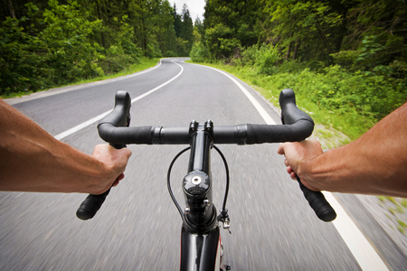 Road cycling wide angle speed shoot. Landscape cycling in roadの写真素材