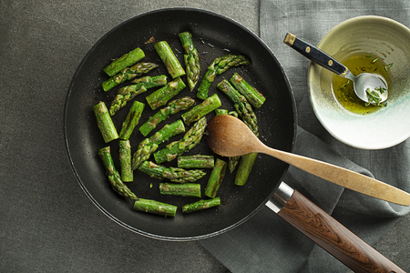 Fresh of green Asparagus. Cooking healthy meal in pan top view- Imageの写真素材