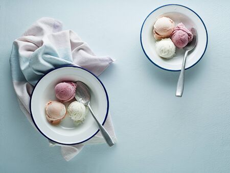Fresh of soft icre cream or frozen yoghurt with fruit flavoursの写真素材