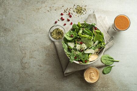 Healthy salad with spinach and seeds. Home made food. Concept for a tasty and healthy meal.の写真素材