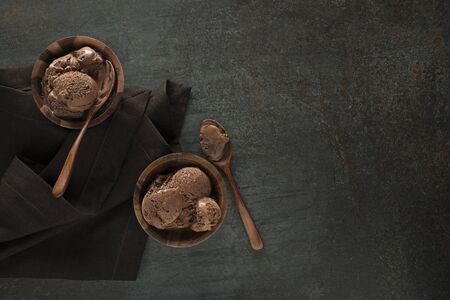 Homemade Organic chocolate Ice Cream scoops in bowls close upの写真素材
