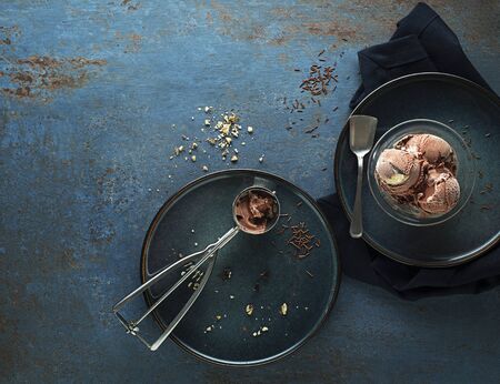 Chocolate ice cream scoop, scooped with a utensilの写真素材