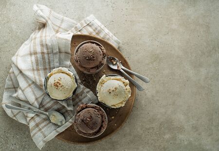 Set of ice cream scoops with chocolate and vanilla flavoursの写真素材
