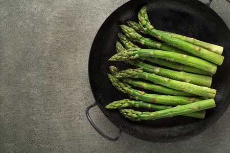 Fresh of green Asparagus. Cooking healthy meal in pan. Bunches of green asparagusの写真素材