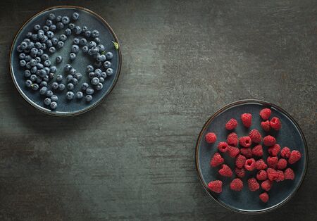 Berries overhead closeup colorful assorted mix of blueberry and raspberry