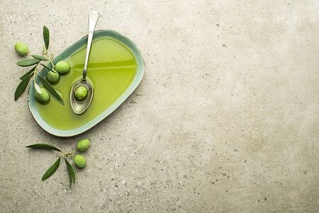 Healthy olive oil with olives ingredients close up. Healthy conceptの写真素材