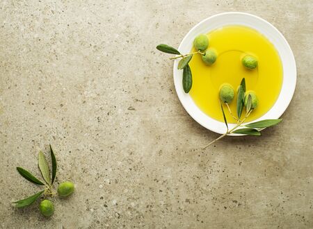Healthy olive oil with olives ingredients close up. Healthy conceptの写真素材