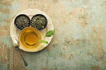 Cup of tea with dry tea collection of different types. Healthy drink conceptの写真素材