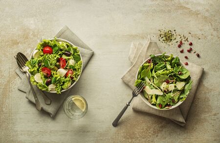 Healthy salads with spinach, cheese, tomato and seeds.の写真素材