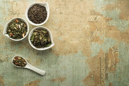 Dry tea leaves collection - classic black and green tea flavourの写真素材