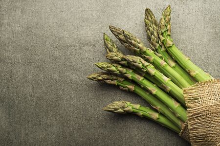 Asparagus. Fresh Asparagus. Green Asparagus. Bunches of green asparagus, top view- Imageの写真素材