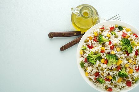 Fresh rice salad with mixed vegetables in a bowl close up shootの写真素材