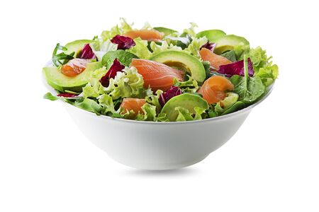 Healthy green salad with smoked salmon and avocado isolated on white backgroundの写真素材