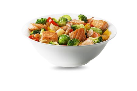 Healthy seafood meal with grilled salmon fish and vegetables isolated on white background. Healthy food. Seafood.の写真素材