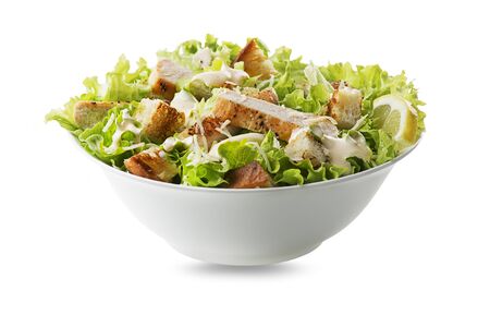Chicken Salad. Chicken Caesar Salad. Caesar Salad with grilled chicken and croutons. Grilled chicken breast and fresh green salad isolated on whiteの写真素材