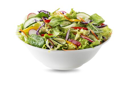 Green lettuce salad with fresh vegetables isolated on white backgroundの写真素材