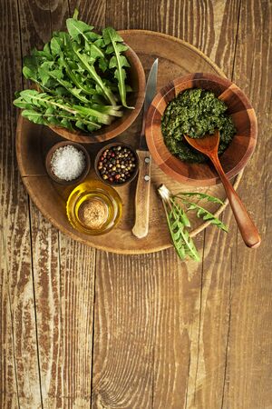 Fresh dandelion leaves overhead shoot. Healthy natural organic food concept - Imageの写真素材