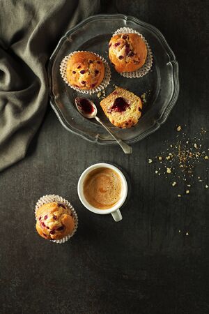 Served dessert with muffins cake and coffee. Continental breakfast tableの写真素材