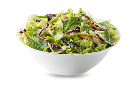 Green lettuce salad with fresh vegetables isolated on white backgroundの写真素材