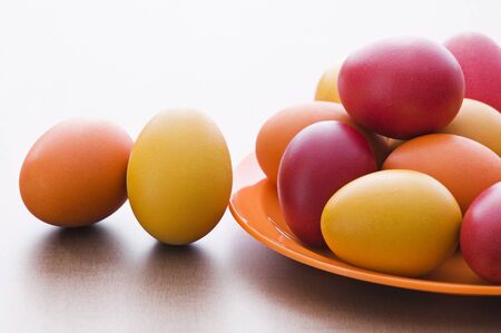 Colorful Easter eggs on wooden table background close upの写真素材