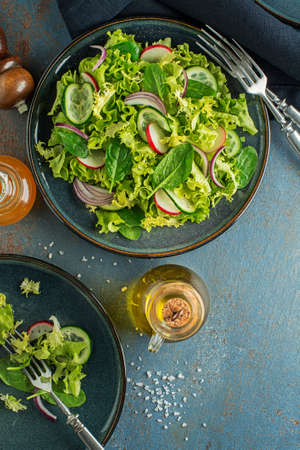 Healthy Green salad with fresh light vegetables close upの写真素材