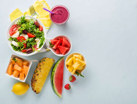 Healthy fresh fruit and vegetable food with summer ingredientsの写真素材