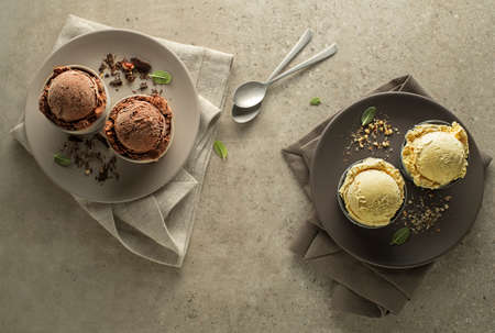 Set of ice cream scoops with chocolate and vanilla flavoursの写真素材