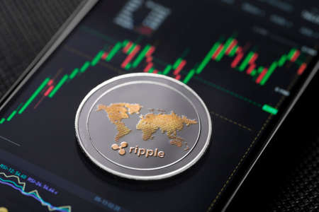 Xrp ripple altcoin trading on smartphone close upの写真素材