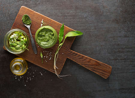 Making Fresh ramson or wild garlic pesto. Healthy spring food conceptの写真素材