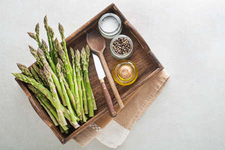 Fresh of green Asparagus. Cooking healthy meal. Bunches of green asparagus, top view- Imageの写真素材